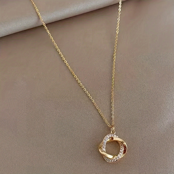 Elegant Gold Pendant Necklace with Simulated Diamonds