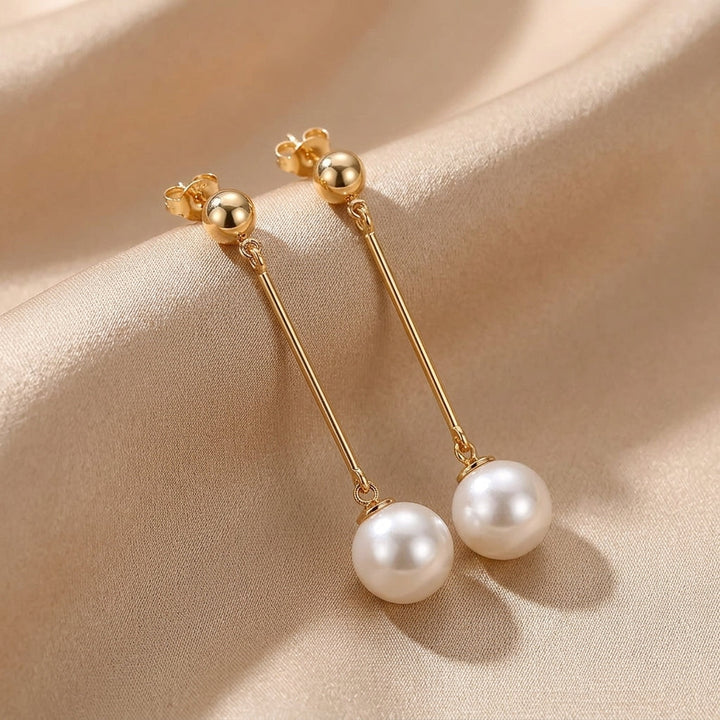 Luxurious Dangling Earrings with Hand-Picked Pearls