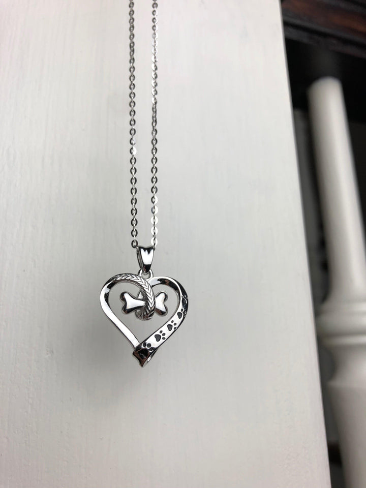 Stainless steel necklace with dog paw and heart