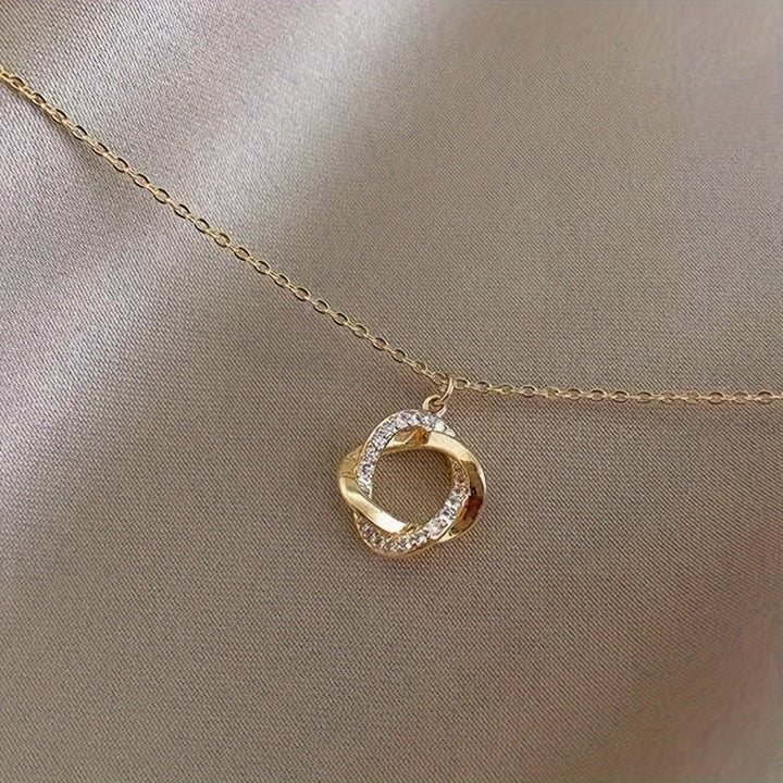 Elegant Gold Pendant Necklace with Simulated Diamonds