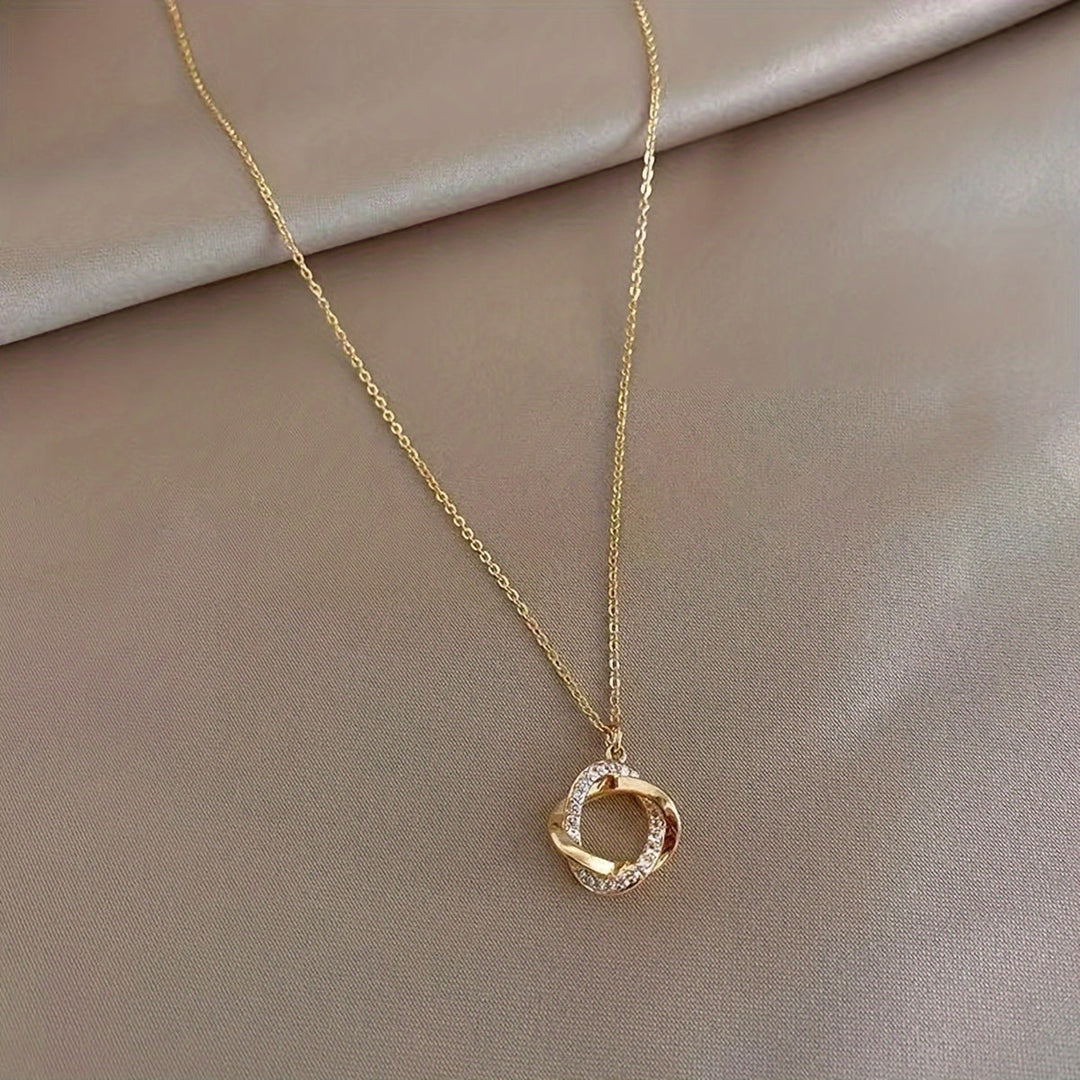 Elegant Gold Pendant Necklace with Simulated Diamonds