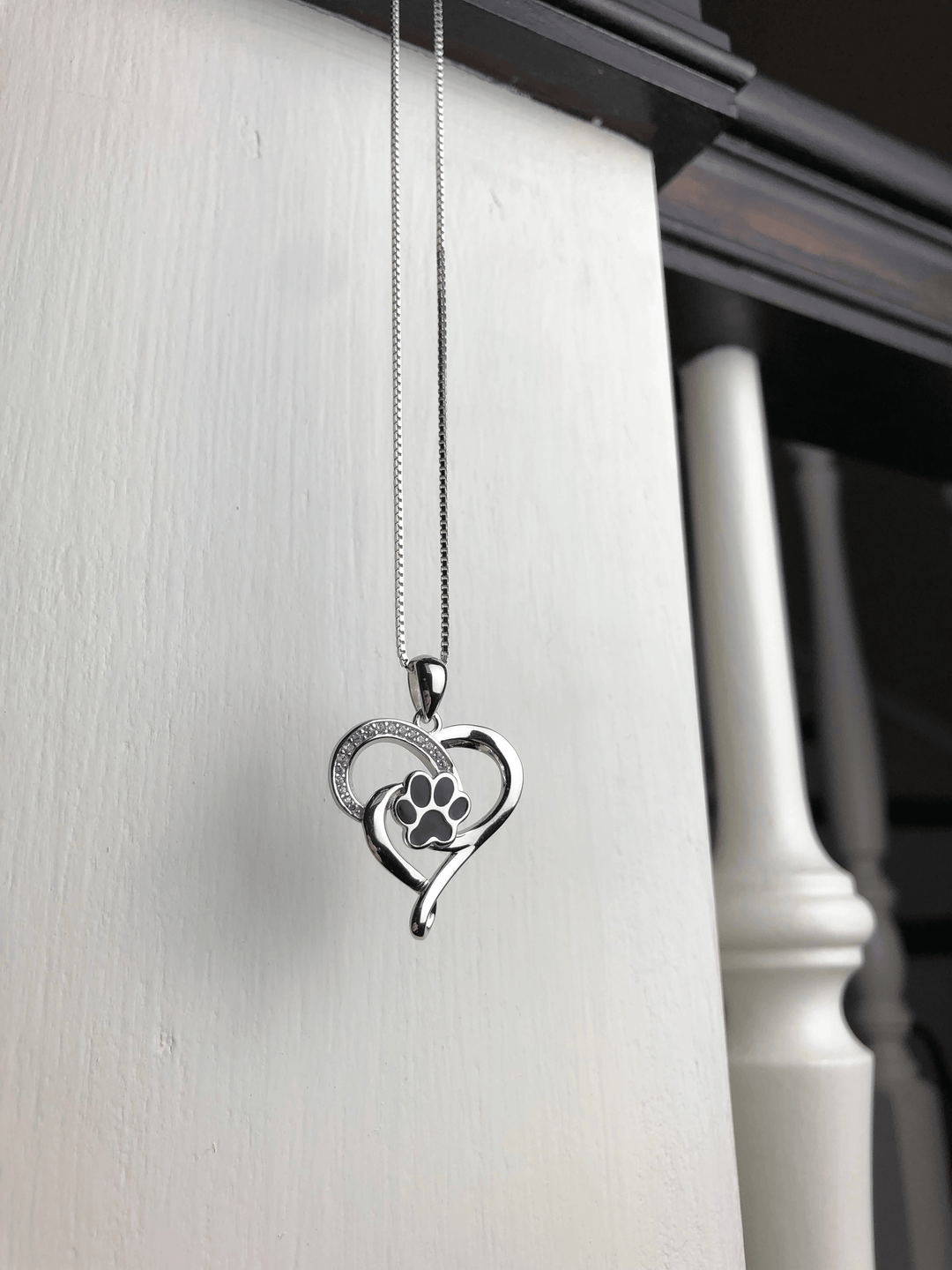Stainless steel necklace with infinity symbol, heart and paw